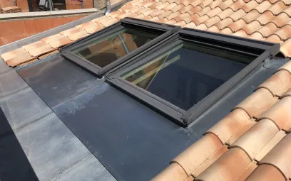 Chéneau en zinc et vélux avec abergement en zinc