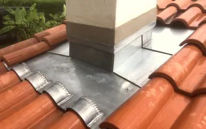 Cheminée avec son abergement en zinc